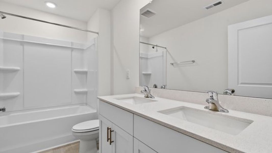 Furnished interior view inside a new home in Shahbain Reserve, Raeford (Image 11).