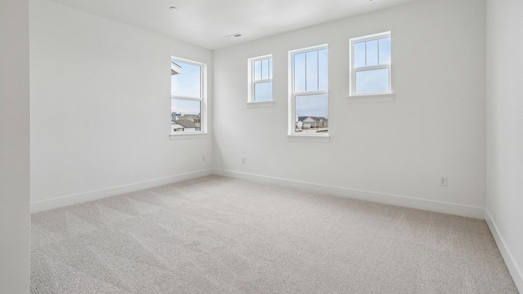 Furnished interior view inside a new home in Dillon Pointe - Journey, Broomfield (Image 29).