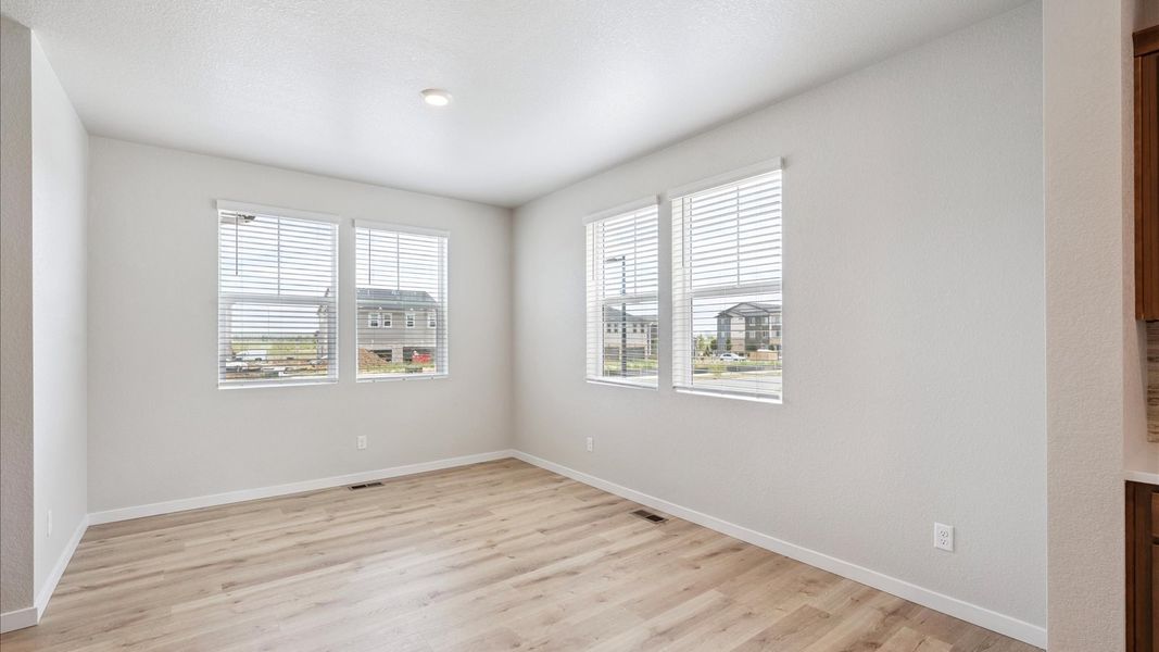Spacious, unfurnished interior of a new home in Sky Ranch, Watkins (Image 8).