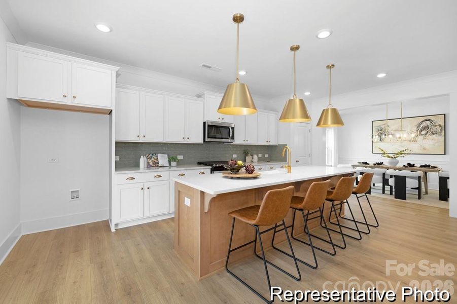 Furnished interior view inside a new home in Whispering Hills, Locust (Image 8).