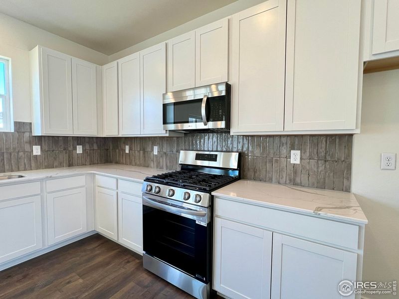 Furnished interior view inside a new home in Union Colony West, Greeley (Image 7).