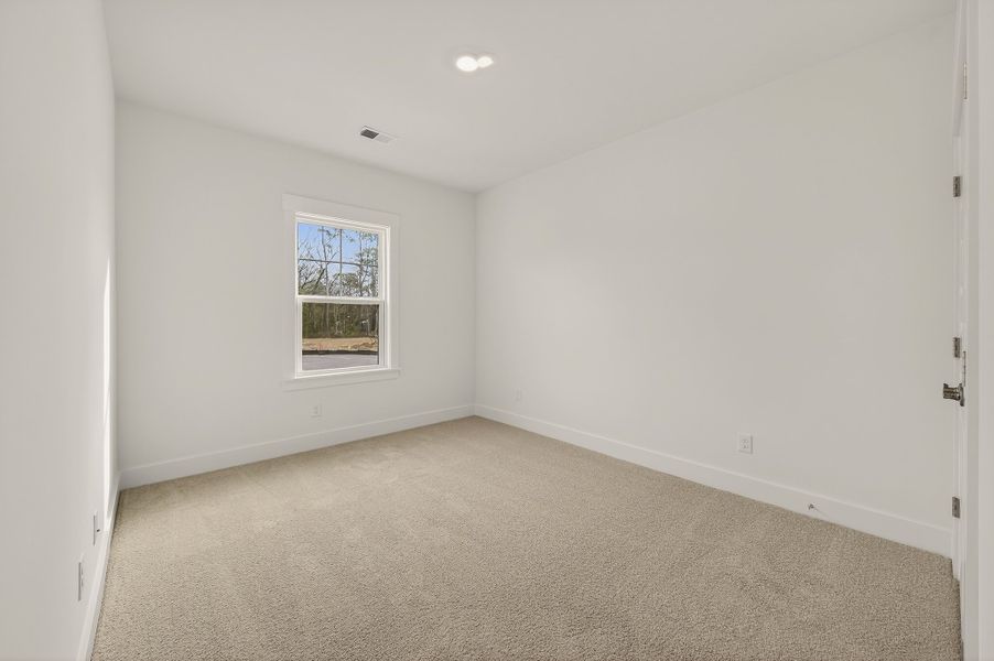 Representative unfurnished interior of a home built from the Ellis by Hunter Quinn Homes in Creek Pointe, Moncks Corner (Image 23).