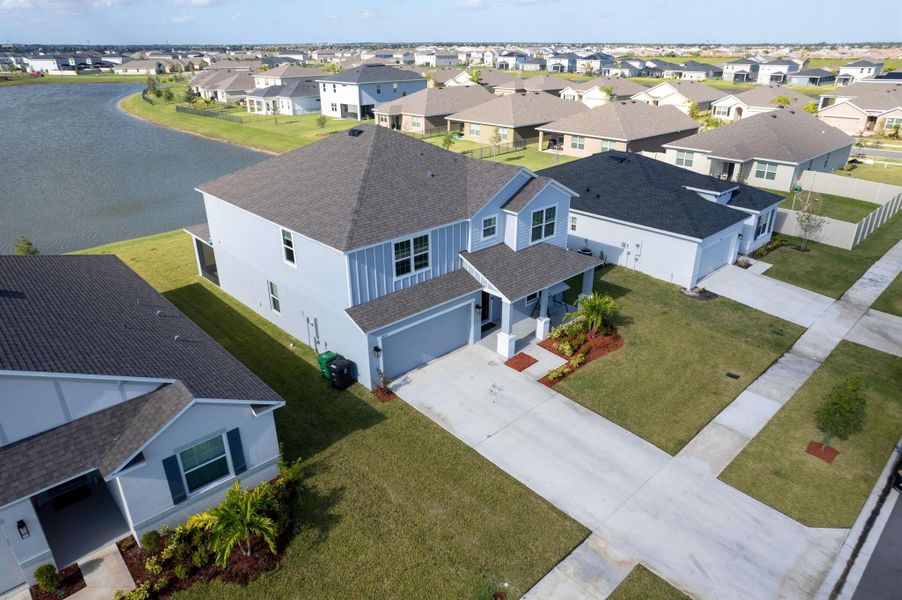 Front exterior of a new home in , Port St. Lucie, FL, highlighting curb appeal (Image 22). Front exterior of a new home in , Port St. Lucie, FL, highlighting curb appeal (Image 22).