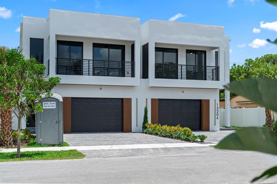 Front exterior of a new home in , Fort Lauderdale, FL, highlighting curb appeal (Image 1). Front exterior of a new home in , Fort Lauderdale, FL, highlighting curb appeal (Image 1).