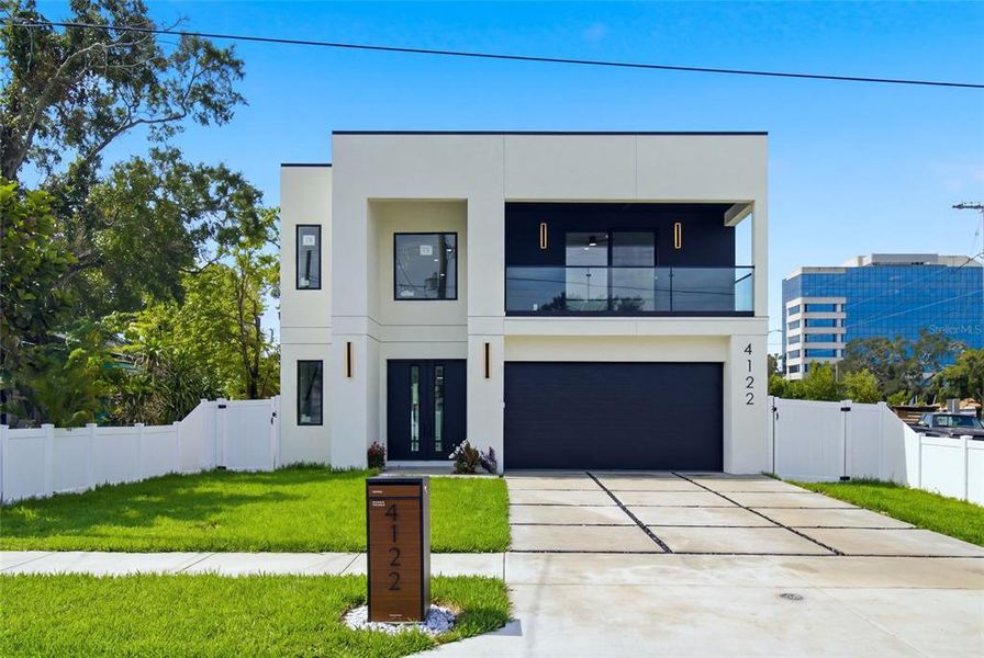 Front exterior of a new home in , Tampa, FL, highlighting curb appeal (Image 26). Front exterior of a new home in , Tampa, FL, highlighting curb appeal (Image 26).