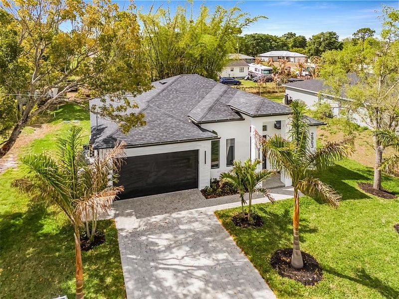Front exterior of a new home in , Lehigh Acres, FL, highlighting curb appeal (Image 23).