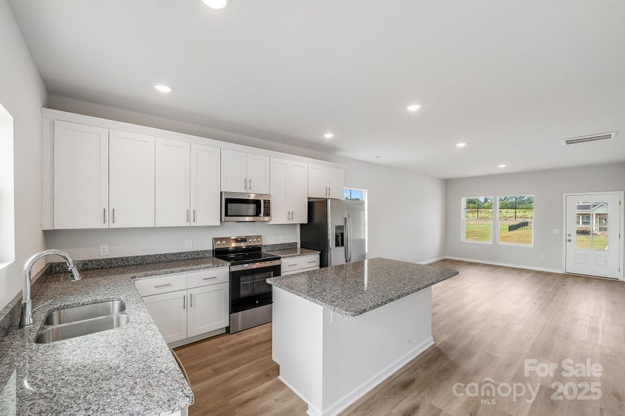 Furnished interior view inside a new home in , Statesville (Image 15).