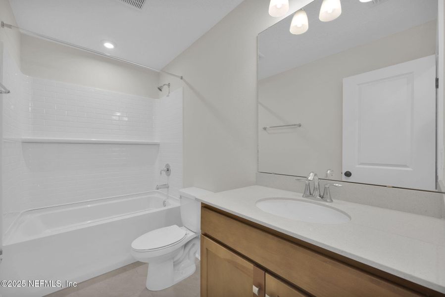 Furnished interior view inside a new home in Trailmark - Phase 10, St. Augustine (Image 14). Furnished interior view inside a new home in Trailmark - Phase 10, St. Augustine (Image 14).