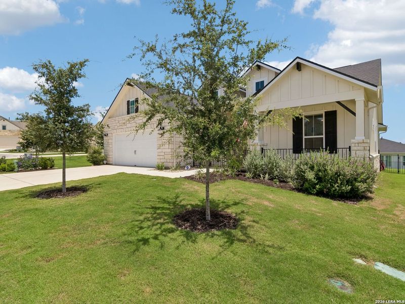 Front exterior of a new home in Kissing Tree, San Marcos, TX, highlighting curb appeal (Image 2). Front exterior of a new home in Kissing Tree, San Marcos, TX, highlighting curb appeal (Image 2).
