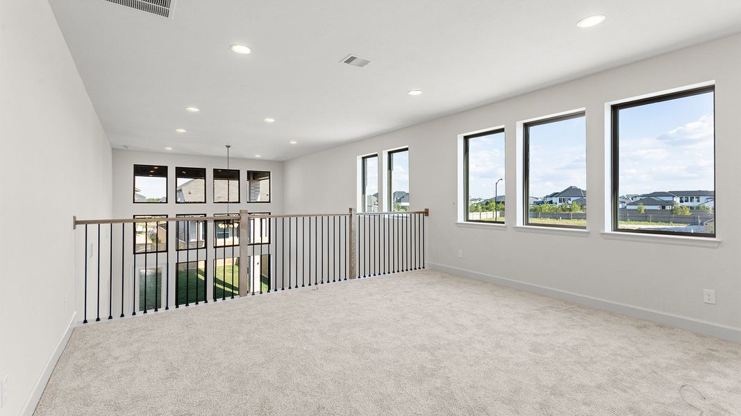 Spacious, unfurnished interior of a new home in Bridgeland, Cypress (Image 12).