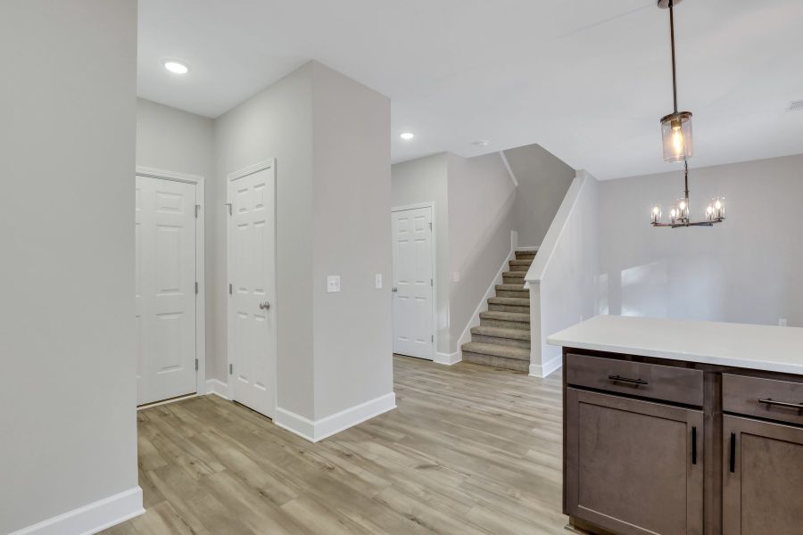 Furnished interior view inside a new home in New Haven At Belmont Glen, Guyton (Image 12).