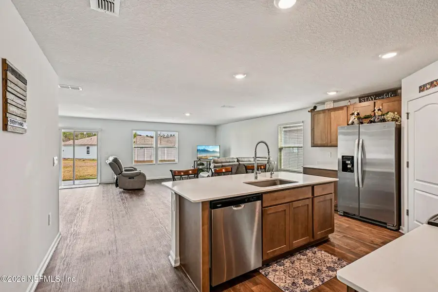 Furnished interior view inside a new home in Cross Creek Express, Green Cove Springs (Image 6).