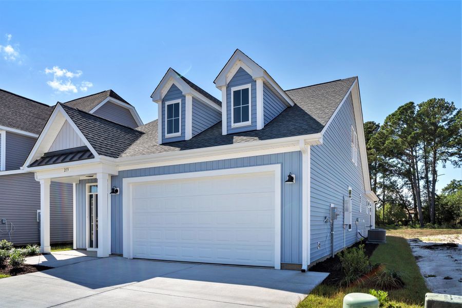 Representative exterior photo of a completed home built from the The Jasmine by Chesapeake Homes in Coastal Club of the Carolinas, Calabash, NC (Image 26).