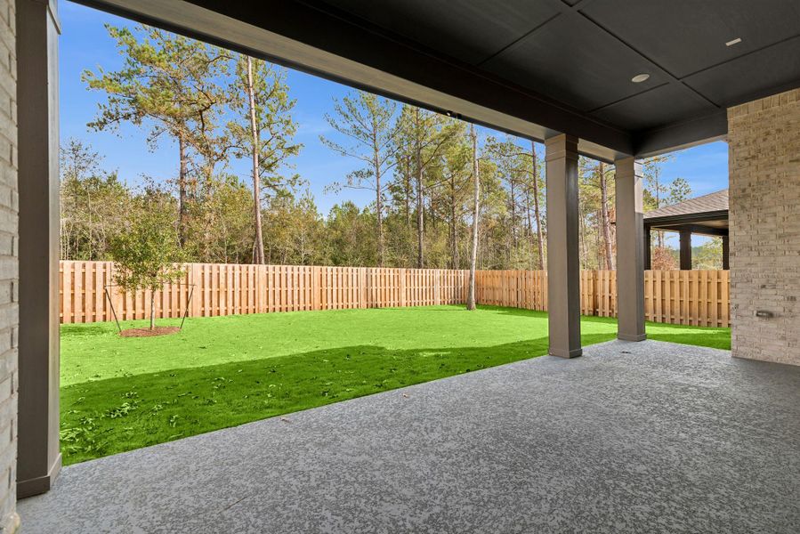Oversized Outdoor Living area with fully sodded and fenced rear yard.