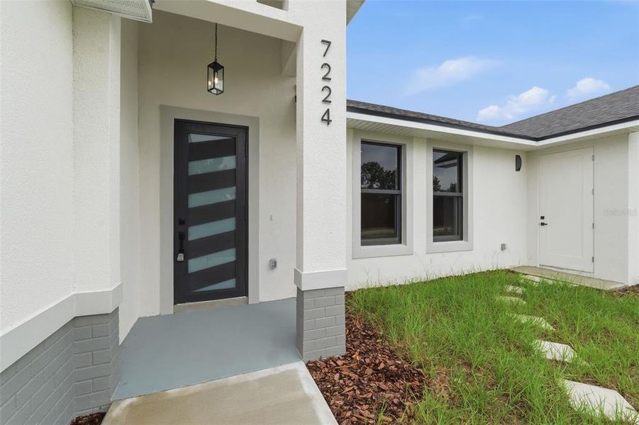 Exterior details and patio area of a home in , Sebring (Image 3). Exterior details and patio area of a home in , Sebring (Image 3).