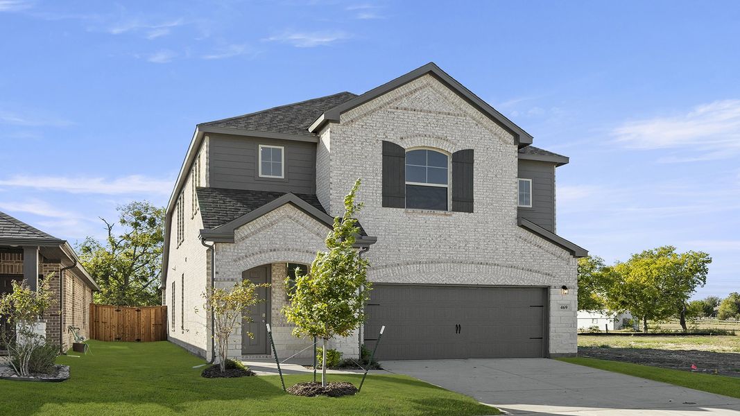 Front exterior of a new home in Elevon 40s, Lavon, TX, highlighting curb appeal (Image 2).