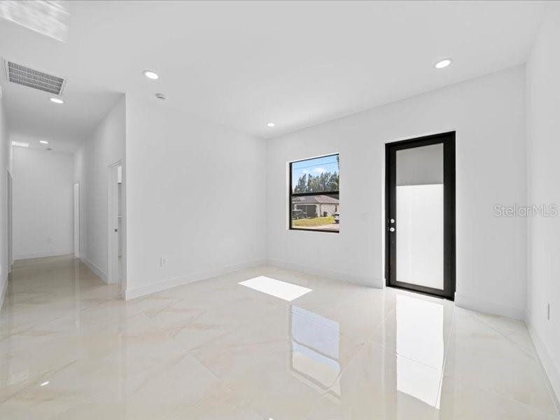 Spacious, unfurnished interior of a new home in , Lehigh Acres (Image 27). Spacious, unfurnished interior of a new home in , Lehigh Acres (Image 27).