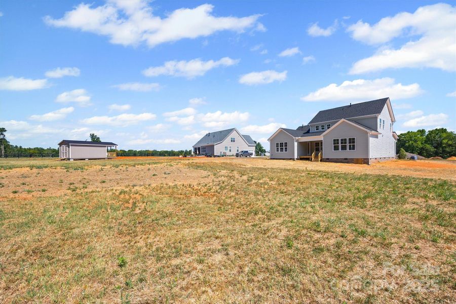 Front exterior of a new home in , Gastonia, NC, highlighting curb appeal (Image 18).
