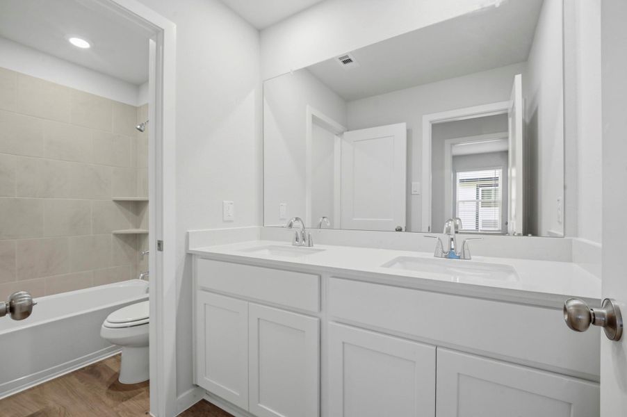Furnished interior view inside a new home in Barrett Crossing, Crosby (Image 10).