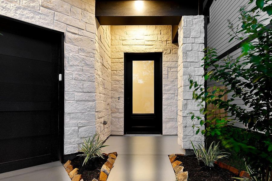 Exterior details and patio area of a home in , The Woodlands (Image 2). Exterior details and patio area of a home in , The Woodlands (Image 2).