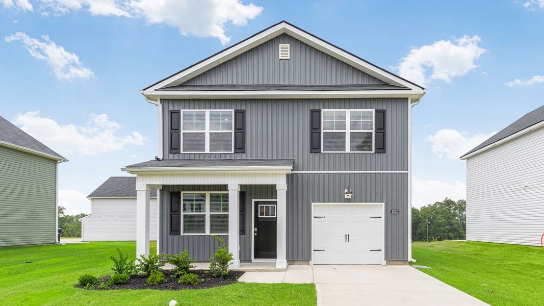 Front exterior of a new home in Estates at Deer Hollow, Grovetown, GA, highlighting curb appeal (Image 1). Front exterior of a new home in Estates at Deer Hollow, Grovetown, GA, highlighting curb appeal (Image 1).