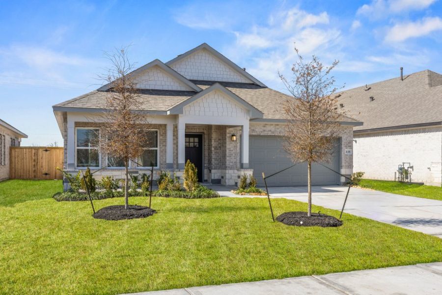 Front exterior of a new home in Ashland, Houston, TX, highlighting curb appeal (Image 22).