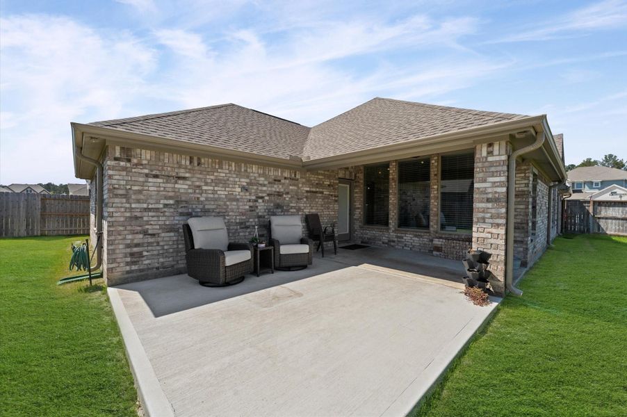 Exterior details and patio area of a home in The Trails, New Caney (Image 24). Exterior details and patio area of a home in The Trails, New Caney (Image 24).