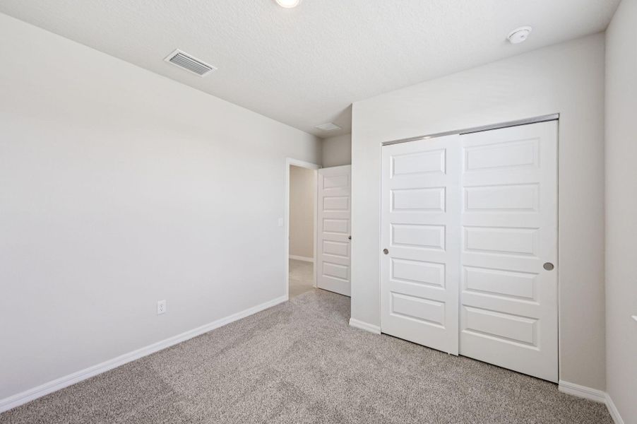 Spacious, unfurnished interior of a new home in Hampton Park - Classic Series, Vero Beach (Image 27).