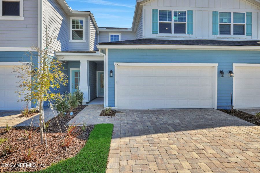 Front exterior of a new home in Brook Forest, St. Augustine, FL, highlighting curb appeal (Image 20).