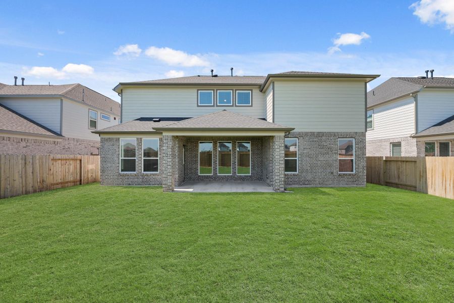 Front exterior of a new home in Briarwood Crossing, Rosenberg, TX, highlighting curb appeal (Image 22). Front exterior of a new home in Briarwood Crossing, Rosenberg, TX, highlighting curb appeal (Image 22).