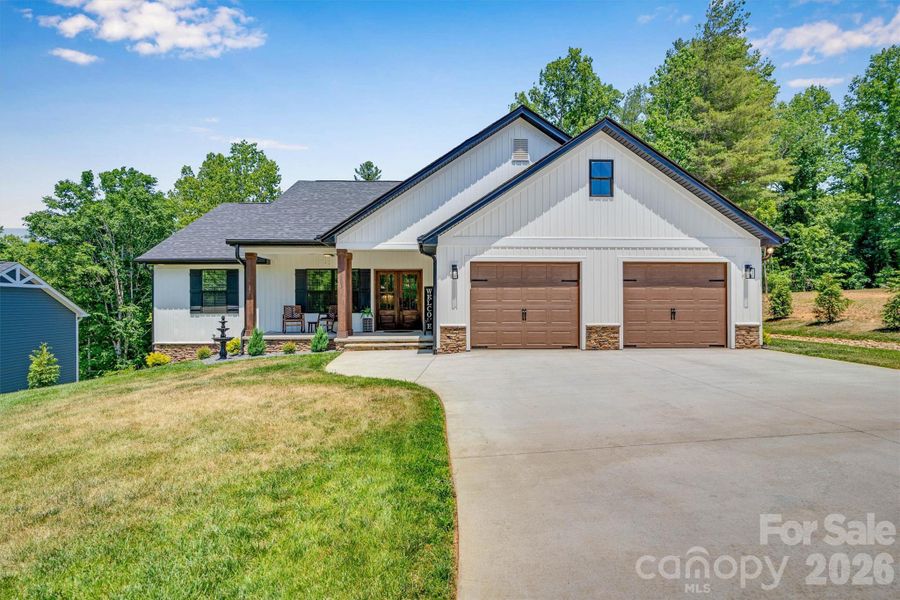 Front exterior of a new home in , Lenoir, NC, highlighting curb appeal (Image 24).