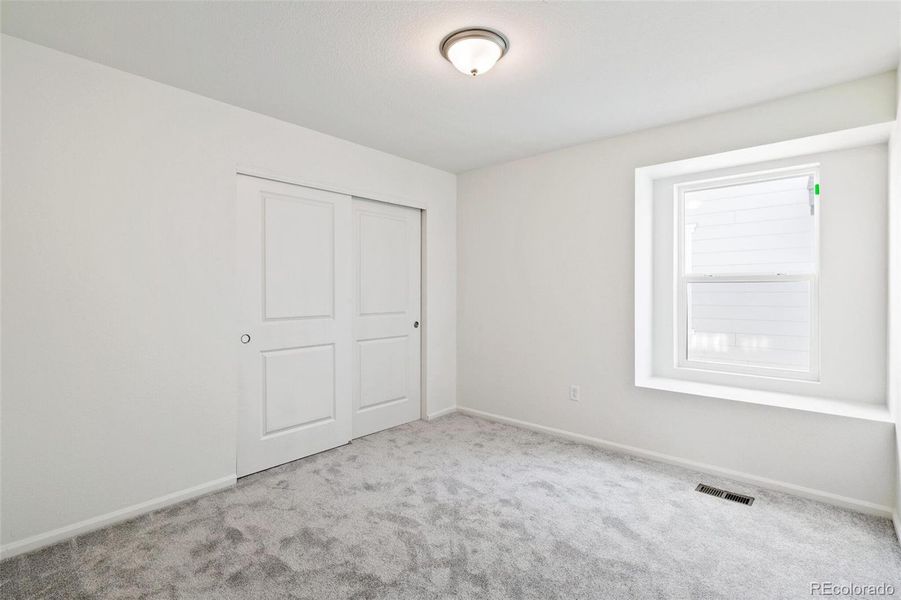 Spacious, unfurnished interior of a new home in Turnberry, Commerce City (Image 30).