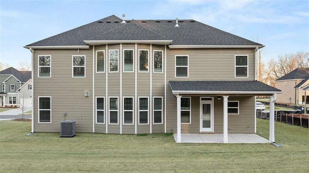 Exterior details and patio area of a home in Heritage Pointe, Senoia (Image 25).