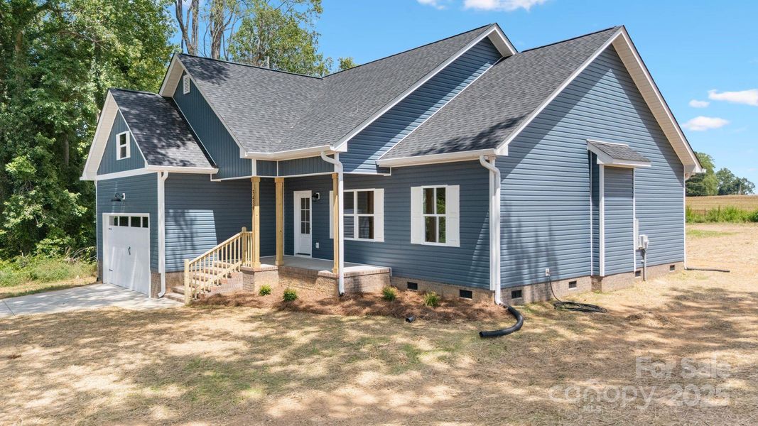 Front exterior of a new home in , Vale, NC, highlighting curb appeal (Image 20). Front exterior of a new home in , Vale, NC, highlighting curb appeal (Image 20).