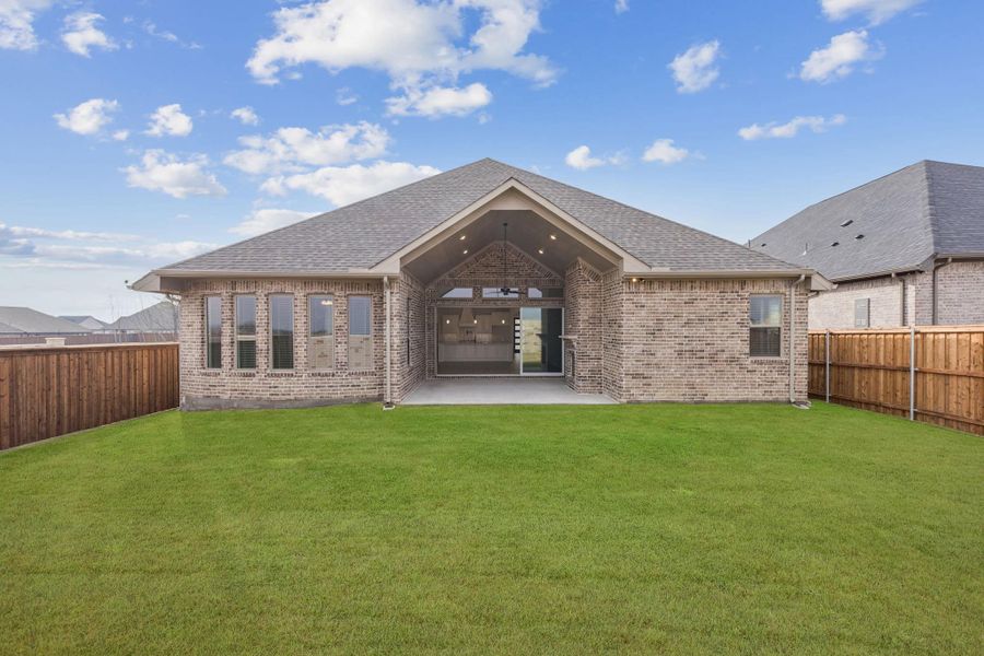 Exterior details and patio area of a home in Trinity Falls, McKinney (Image 3). Exterior details and patio area of a home in Trinity Falls, McKinney (Image 3).