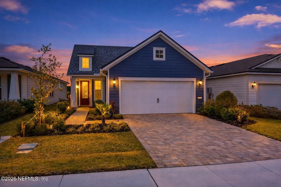Front exterior of a new home in , Yulee, FL, highlighting curb appeal (Image 1). Front exterior of a new home in , Yulee, FL, highlighting curb appeal (Image 1).