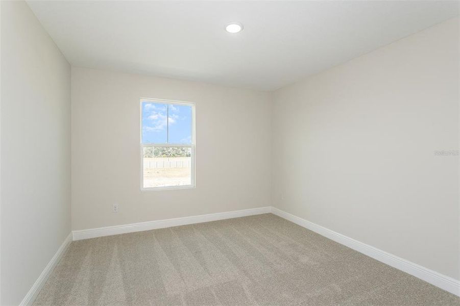 Spacious, unfurnished interior of a new home in Pasadena Woods, Dade City (Image 19).