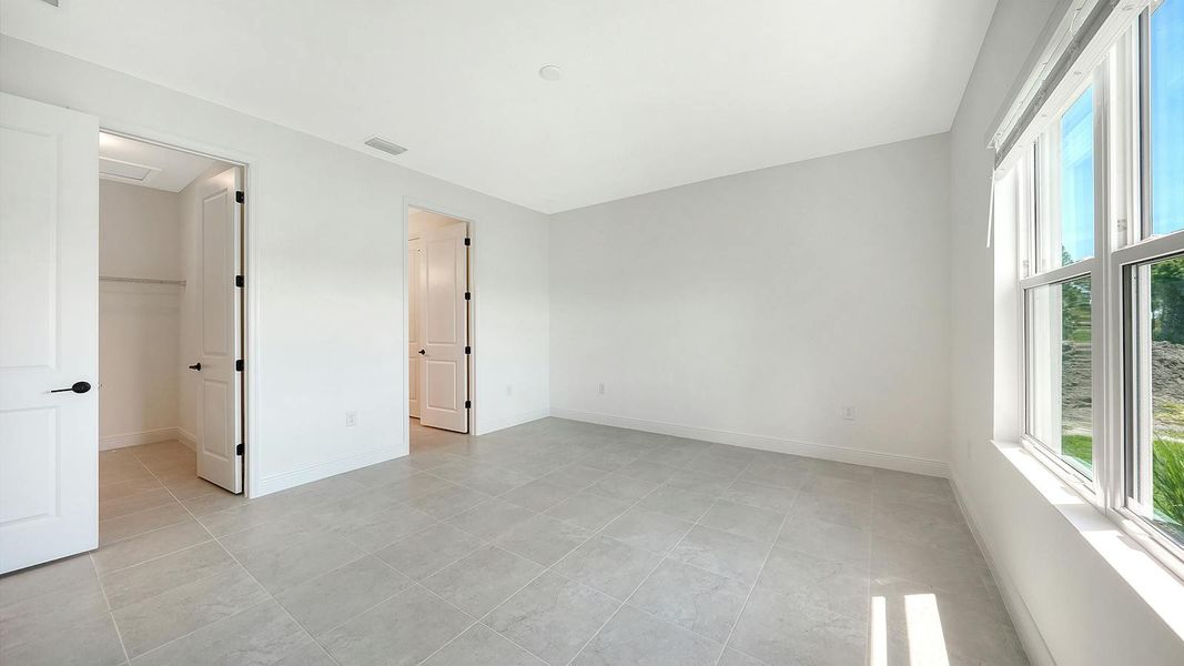 Spacious, unfurnished interior of a new home in Palmera Real Estate and Homes for Sale in Venice, FL - Neal Communities, Venice (Image 20). Spacious, unfurnished interior of a new home in Palmera Real Estate and Homes for Sale in Venice, FL - Neal Communities, Venice (Image 20).