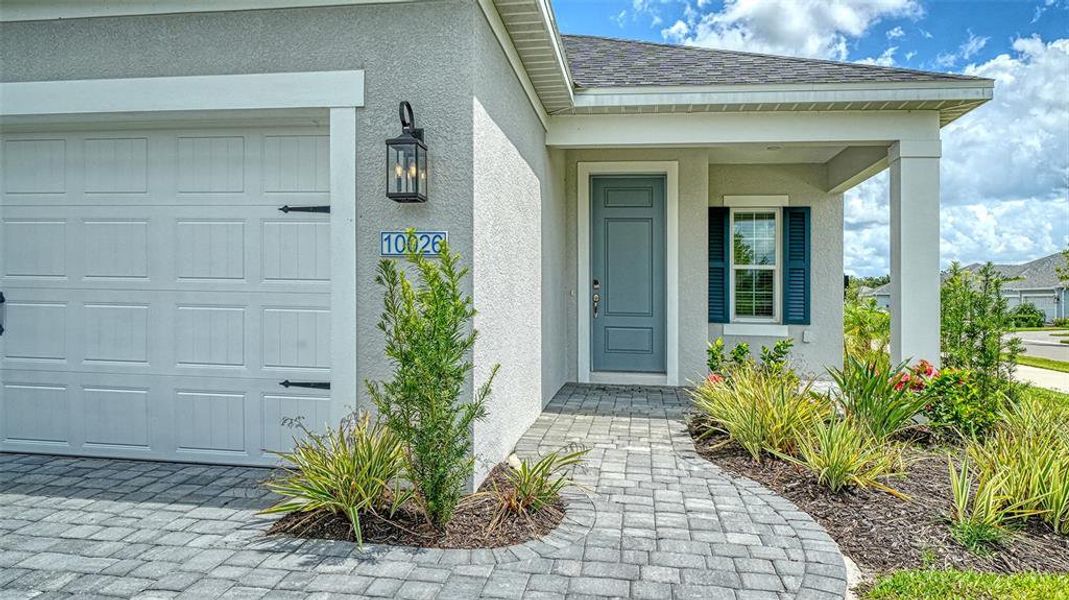 Exterior details and patio area of a home in Wildleaf at North River Ranch, Parrish (Image 3).