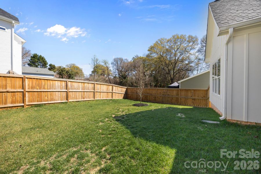 Exterior details and patio area of a home in , Belmont (Image 25).