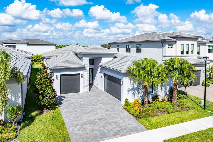 Front exterior of a new home in , Boca Raton, FL, highlighting curb appeal (Image 26). Front exterior of a new home in , Boca Raton, FL, highlighting curb appeal (Image 26).