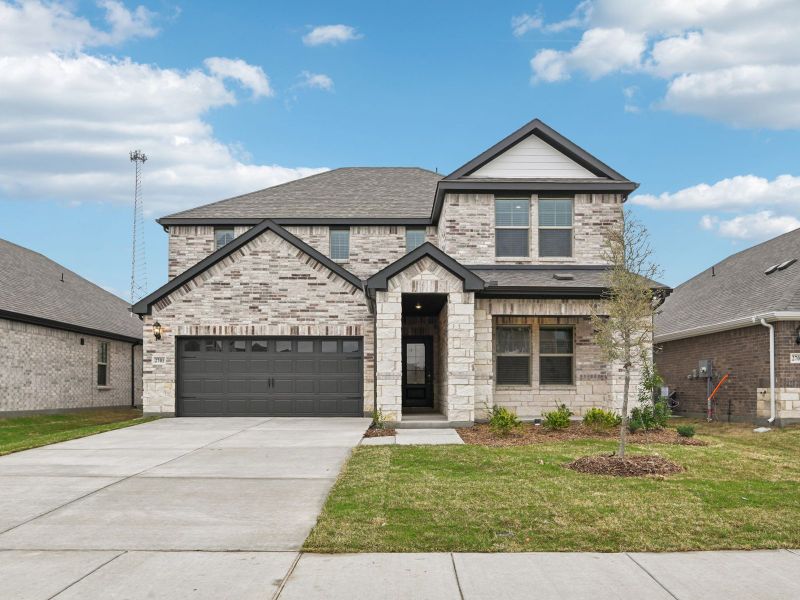 Front exterior of a new home in Parks at Foster Crossing - Signature Series, Anna, TX, highlighting curb appeal (Image 1). Front exterior of a new home in Parks at Foster Crossing - Signature Series, Anna, TX, highlighting curb appeal (Image 1).