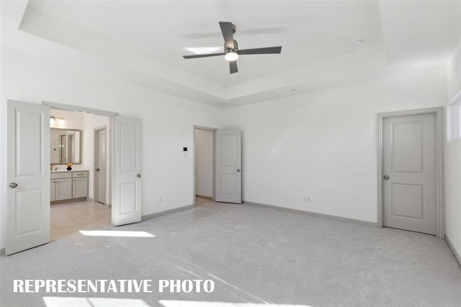 Offering two, spacious walk in closets and a gorgeous en suite bath, this owner's suite was designed with you in mind!  REPRESENTATIVE PHOTO