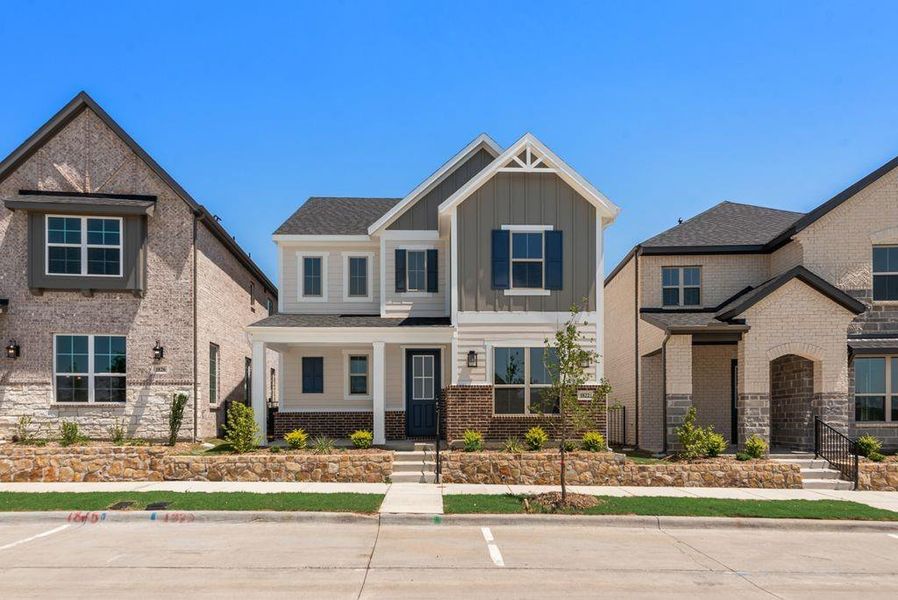 Front exterior of a new home in Bayside, Rowlett, TX, highlighting curb appeal (Image 21).