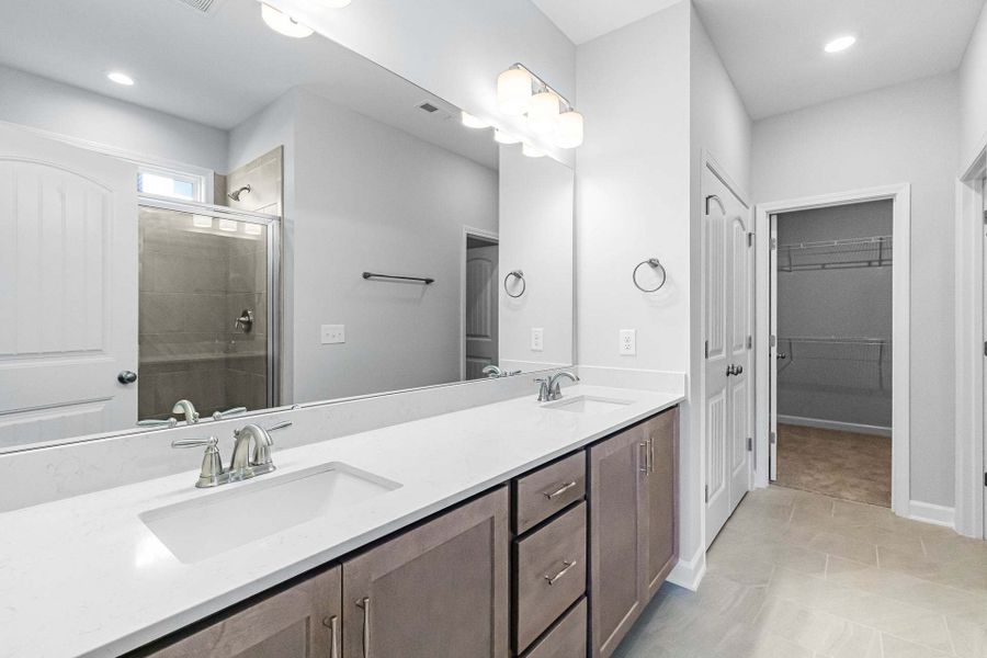 Representative furnished interior of a home built from the Weymouth by Caviness & Cates Communities in Bartlett Manor, Youngsville (Image 148).