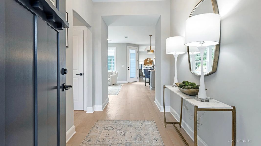 Furnished interior view inside a new home in The Courtyards at Bailey Farm, Dacula (Image 17).