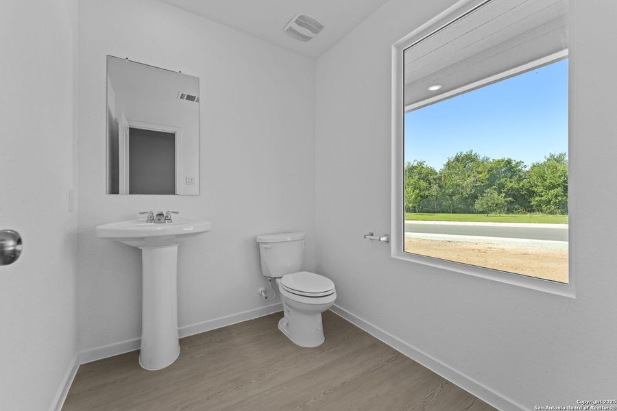 Furnished interior view inside a new home in Lodi Grove, Floresville (Image 6).