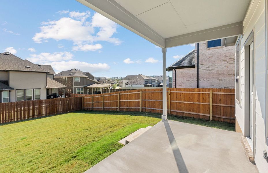 Exterior details and patio area of a home in Saddleback at Santa Rita Ranch, Liberty Hill (Image 4).