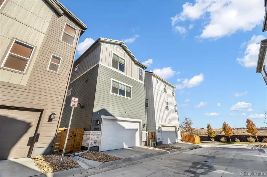 Front exterior of a new home in , Parker, CO, highlighting curb appeal (Image 1). Front exterior of a new home in , Parker, CO, highlighting curb appeal (Image 1).