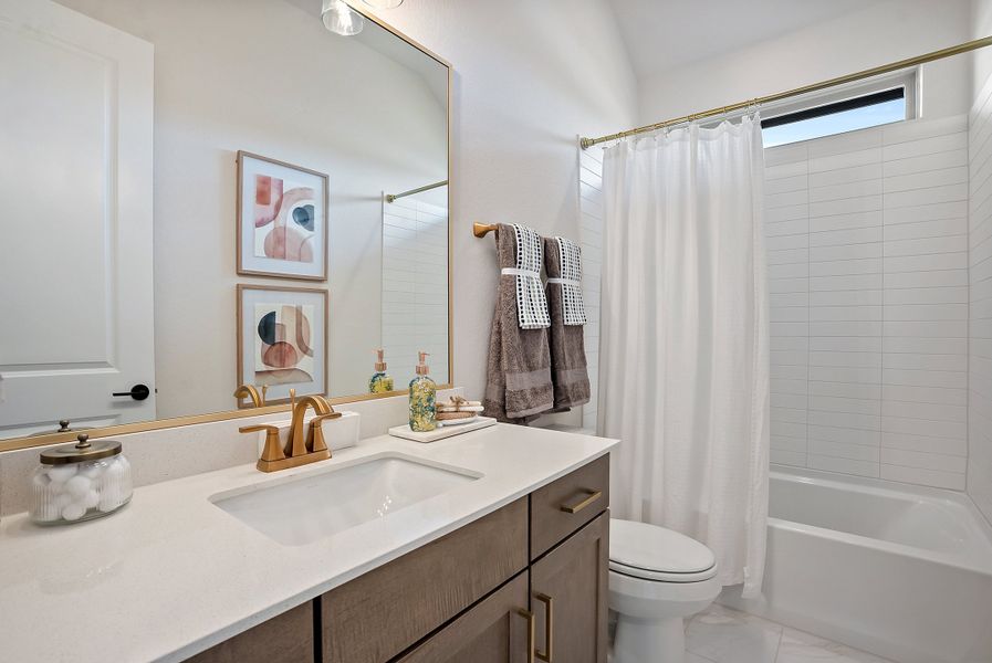 Representative furnished interior of a home built from the Cheyenne II by Ashton Woods in The Colony 50s, Bastrop (Image 7).